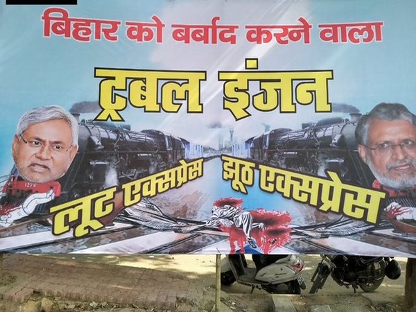 A poster put up by RJD against JDU in Patna [Photo/ANI]