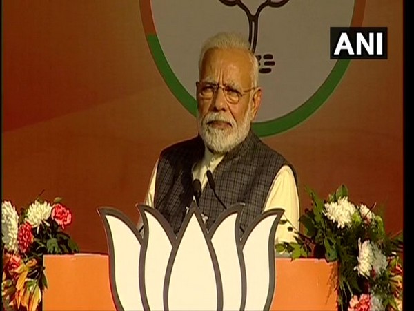 Prime Minister Modi addressing an election rally at Karkardooma in Delhi  on Monday. Photo/ANI