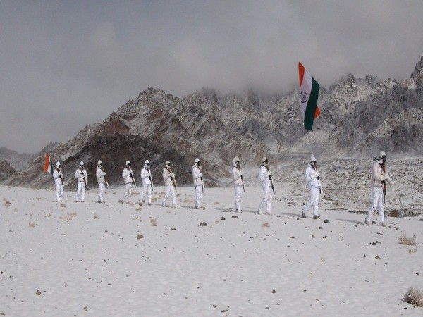 Indo-Tibetan Border Police (ITBP) personnel with the national flag celebrating Republic Day. 