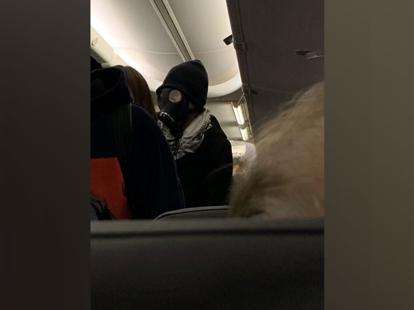 The man, whose identity is still unknown was subsequently escorted off the plane (Picture Courtesy: Twitter)
