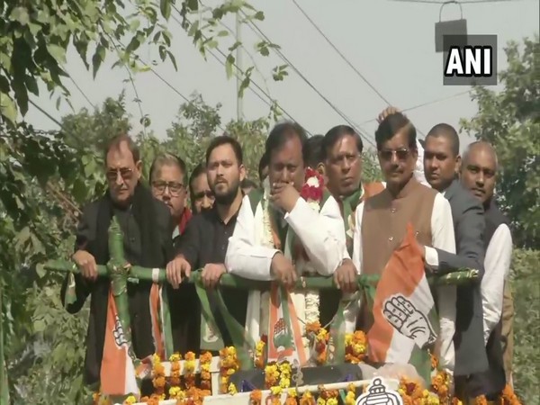 Tejashwi Yadav holding roadshow in support of party candidate from Palam, Nirmal Kumar Singh, in Dwarka on Sunday. Photo/ANI