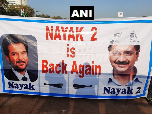  A banner seen at Ramlila Ground where preparations are underway for the swearing-in ceremony of Chief Minister-designate Arvind Kejriwal in Delhi [Photo/ANI]