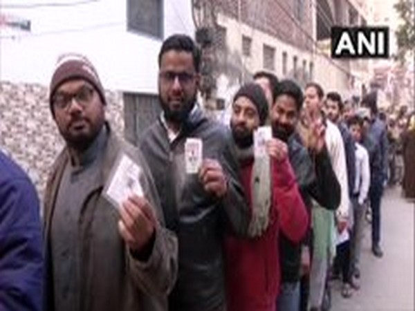 A queue of voters at a polling booth in Shaheen Public School in Shaheen Bagh, Okhla. [File Photo/ANI]