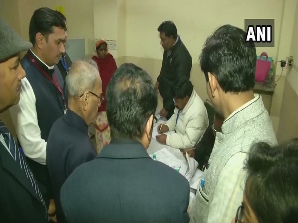 Former President Pranab Mukherjee cast his vote at a polling station at Kamraj lane in New Delhi Constituency.