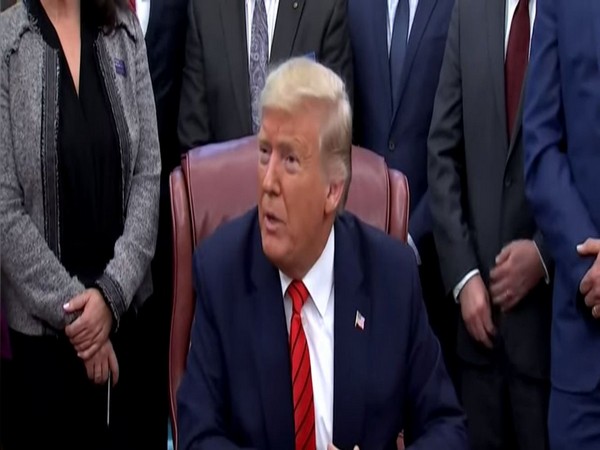 US President Donald Trump speaking to reporters at the White House on Tuesday.