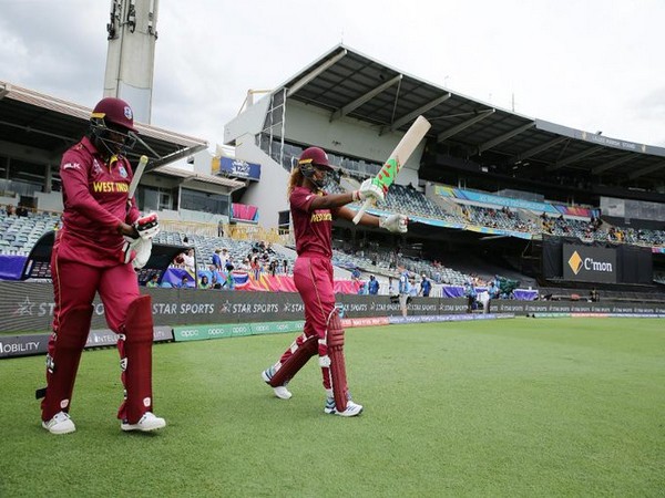 West Indies openers going out to bat against Thailand (Photo/ T20 World Cup Twitter)