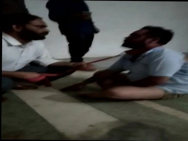  Man beaten up and dragged by a leash in Ghaziabad [Photo/ANI]