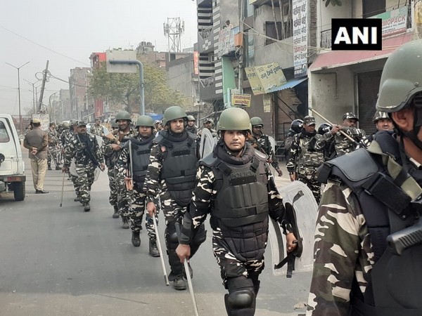 Security personnel conducting flag-march in Babarpur area on Wednesday.