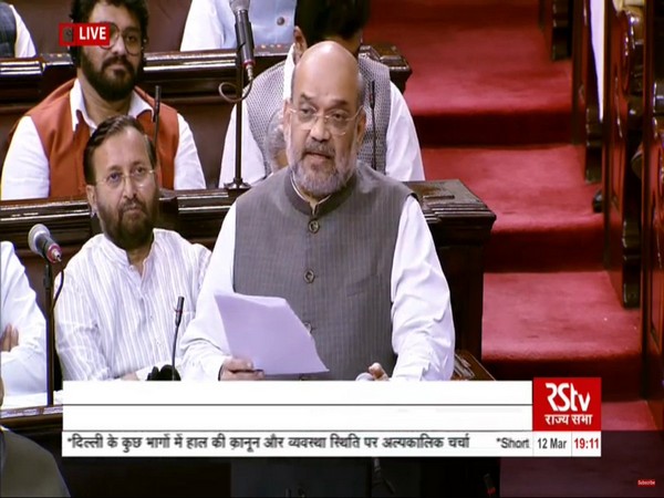 Union Home Minister Amit Shah speaking in the Rajya Sabha on Thursday.  Photo/RSTV