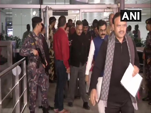 BJP MLAs arrive at Delhi Airport in the wee hours of Wednesday. Photo/ANI
