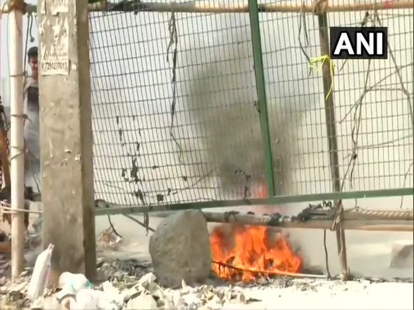 Protesters at Shaheen Bagh allege that a petrol bomb was hurled nearby the anti-Citizenship Amendment Act protest site on Sunday. Photo/ANI