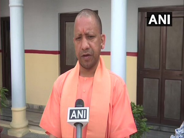 Uttar Pradesh Chief Minister Yogi Adityanath speaking to reporters on Sunday. Photo/ANI
