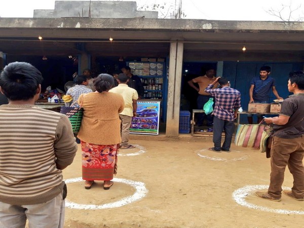 People practicing social distancing in markets near West Garo HILLS