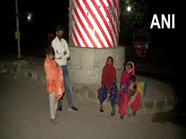 Migrant workers in search of shelters outside Sarvodaya Co-ed Senior Secondary School