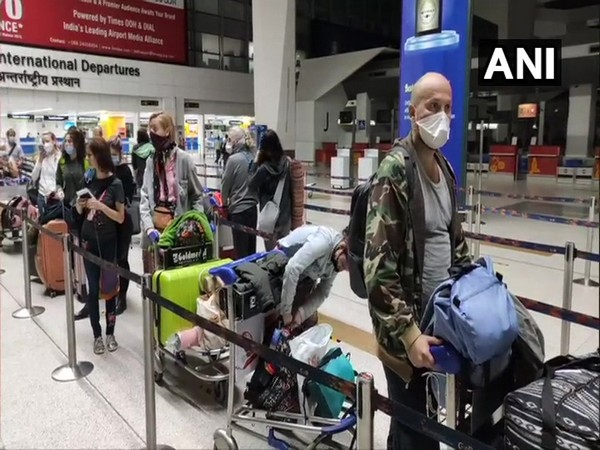 Stranded Russian nationals at Indira Gandhi International Airport in Delhi on Wednesday