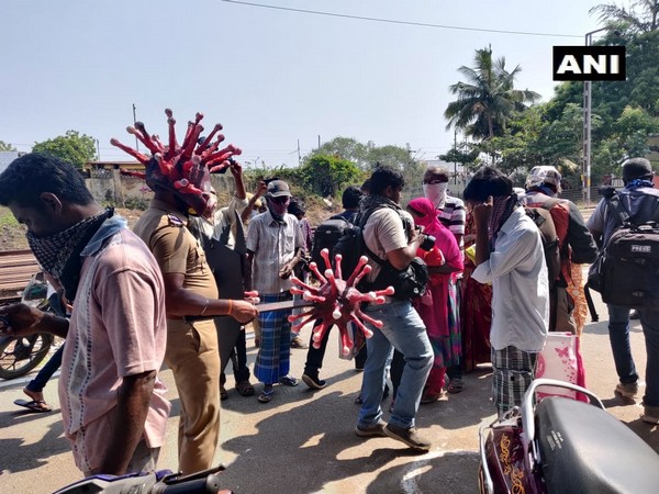 Police inspector Rajesh Kumar spreading awareness of Coronavirus wearing Corona look-alike helmate and mace