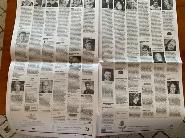 The Boston Globe published 16 pages of obituaries in its Sunday, April 19 print edition. (Image credit: Nancy Palmer/Twitter)