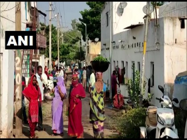 People were seen flouting social distancing norms in Karnataka's Bagalkot on Sunday. Photo/ANI