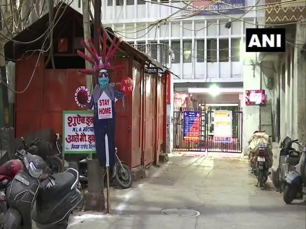 Delhi Police installed coronavirus-lookalike screcrow in Chandni Mahal area (Phot/ANI)