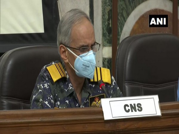 Indian Navy Chief Admiral Karambir Singh speaking to reporters on Friday.