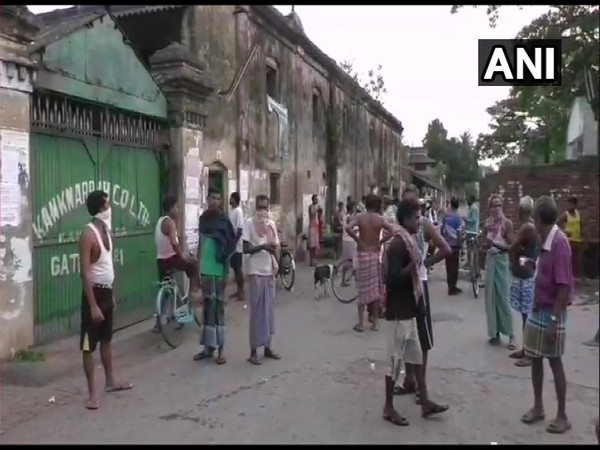 Workers gathered outside jute mills in Barrackpore.
