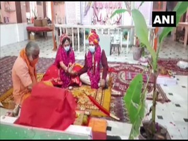 Rajasthan couple ties the knot at a temple with families witnessing the rituals via video conference. Photo/ANI
