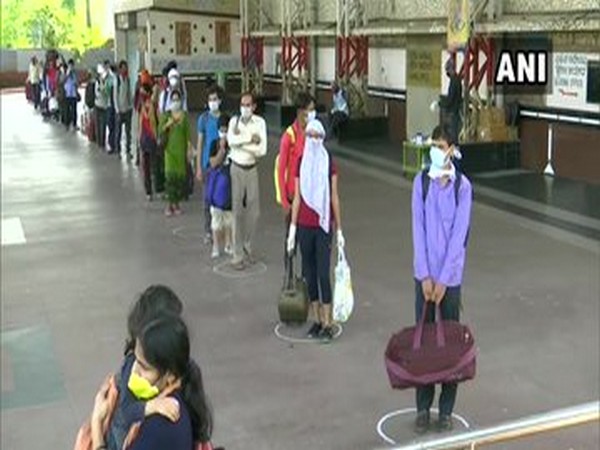 Passengers waiting at Bhubaneswar Railway Station to board a train. Photo/ANI