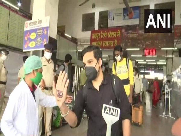 Quarantine stamps were applied on passengers in Raipur. Photo/ANI