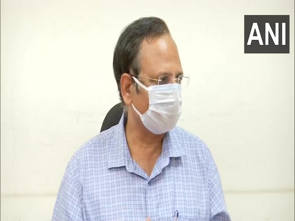 Delhi Health Minister Satyendar Jain speaking to reporters on Thursday