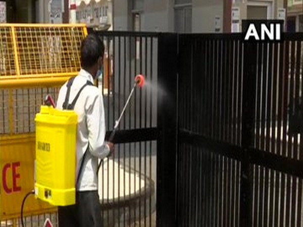  Sanitisation work being carried out at Gazipur market today. [Photo/ANI]