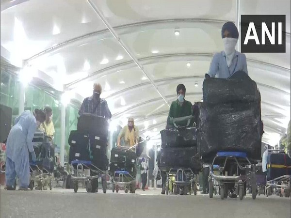 United Kingdom (UK) nationals at Sri Guru Ram Dass Jee International Airport in Amritsar (Photo/ANI)