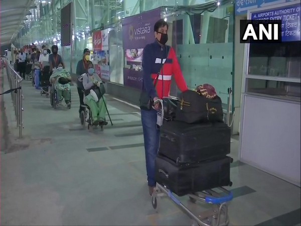 NRIs depart for the United Kingdom from Sri Guru Ram Dass Jee International Airport in Amritsar (Photo/ANI)