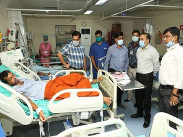 Raigarh Superintendent of Police Santosh Singh and Collector Yashwant Kumar meet gas leak victims on Thursday [Photo/ANI]