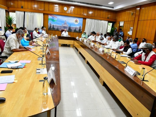 Karnataka Chief Minister BS Yediyurappa holding a meeting with opposition parties over state's COVID-19 situation in Bengaluru on Friday.