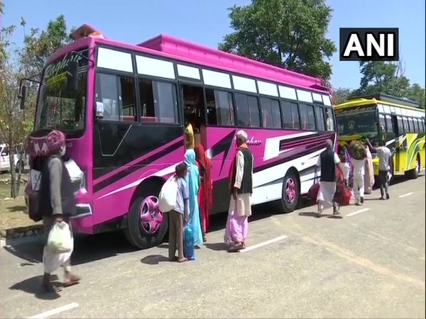Stranded passengers in Jammu sent back to native states via bus on Friday (Photo/ANI)
