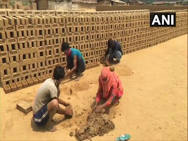 Workers at a brick kiln in Moradabad, Uttar Pradesh. 