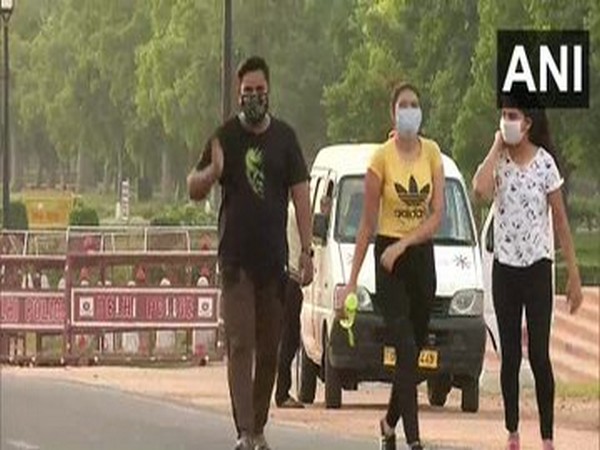 People enjoying a stroll at Rajpath on Tuesday morning. [Photo/ANI]