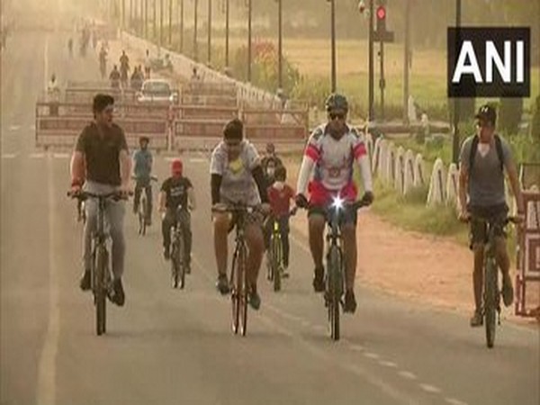 People out for cycling and walking at the Rajpath area following relaxations in the fourth phase of lockdown [Photo/ANI]