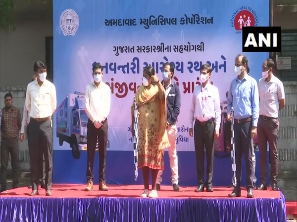 Ahmedabad Mayor Bijal Patel flagged off vans for COVID-19 screening on Friday (Photo/ANI)