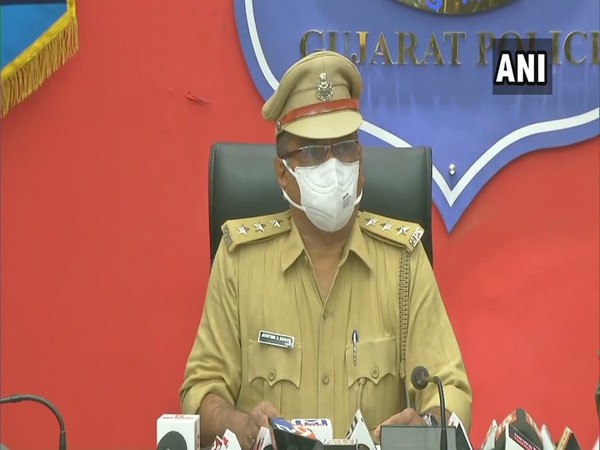 J H Sarvaiya ACP, Rajkot speaking to the reporters (Photo/ANI)