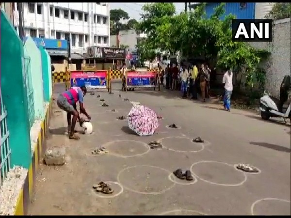 People put their belongings in long queue to save their spot outside liquor shops in Tamil Nadu. 