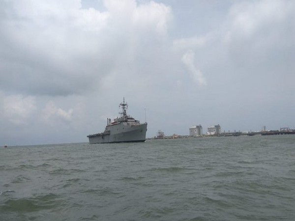 INS Jalashwa carrying 588 Indians from Maldives enters Kochi Harbour. 