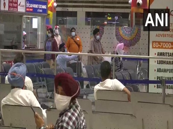 A flight carrying Indian nationals from Kuala Lumpur lands in Amritsar. [Photo/ANI
