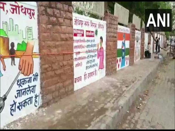 Walls of Sampurnanand Medical College in Jodhpur painted with slogans and messages to spread awareness regarding COVID-19. [Photo/ANI]