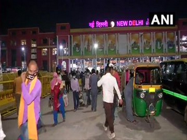Passengers and cab/auto drivers at New Delhi Railway Station. [Photo/ANI]
