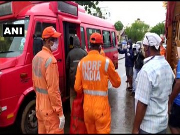 NDRF team evacuating residents living near the seashore from Versova area on Wednesday. [Photo/ANI]