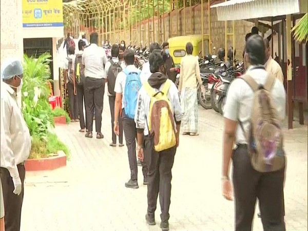 Students arrive at Mount Carmel College for the 2nd PUC Exam 2020 English paper in Karnataka on Thursday. [Photo/ANI]
