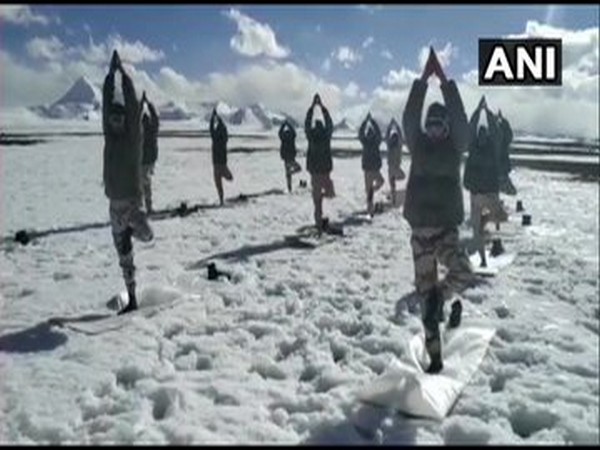  The soldiers of the ITBP performed yoga asanas at an altitude of 18,000 feet on the occasion of the International Yoga Day. [Photo/ANI]