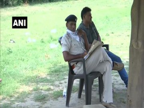 Bihar Police SI Janardan Ram along with other official waiting outside Congress MLA Navjot Singh Sidhu's residence in Amritsar (Photo/ANI)