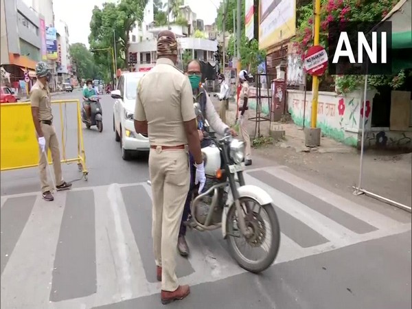  Shops closed, and police personnel check vehicles in Pune. Municipal Corporation has ordered lockdown in Pune in two phases till July 18.